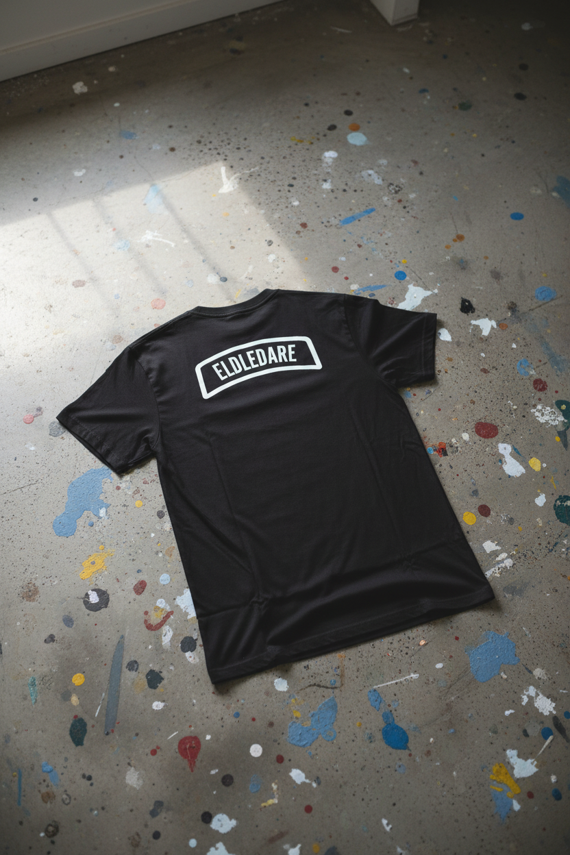 T-shirt Eldledare – rygg, betonggolv